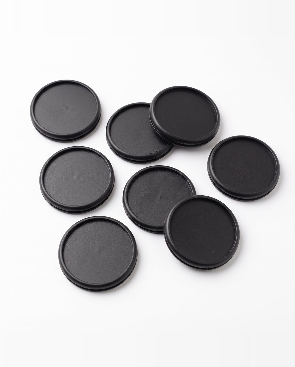 Eight matte black 1 inch discbound planner discs, 28mm, the full set of 8