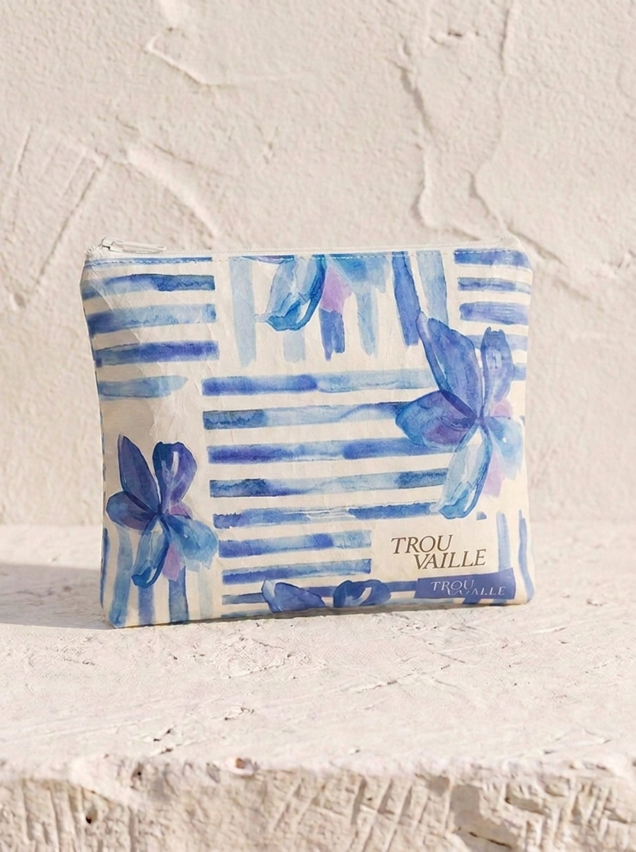 Blue Lines small water-resistant accessory bag — an 8 x 7 inch zip travel pouch in a blue watercolor stripe and flower print