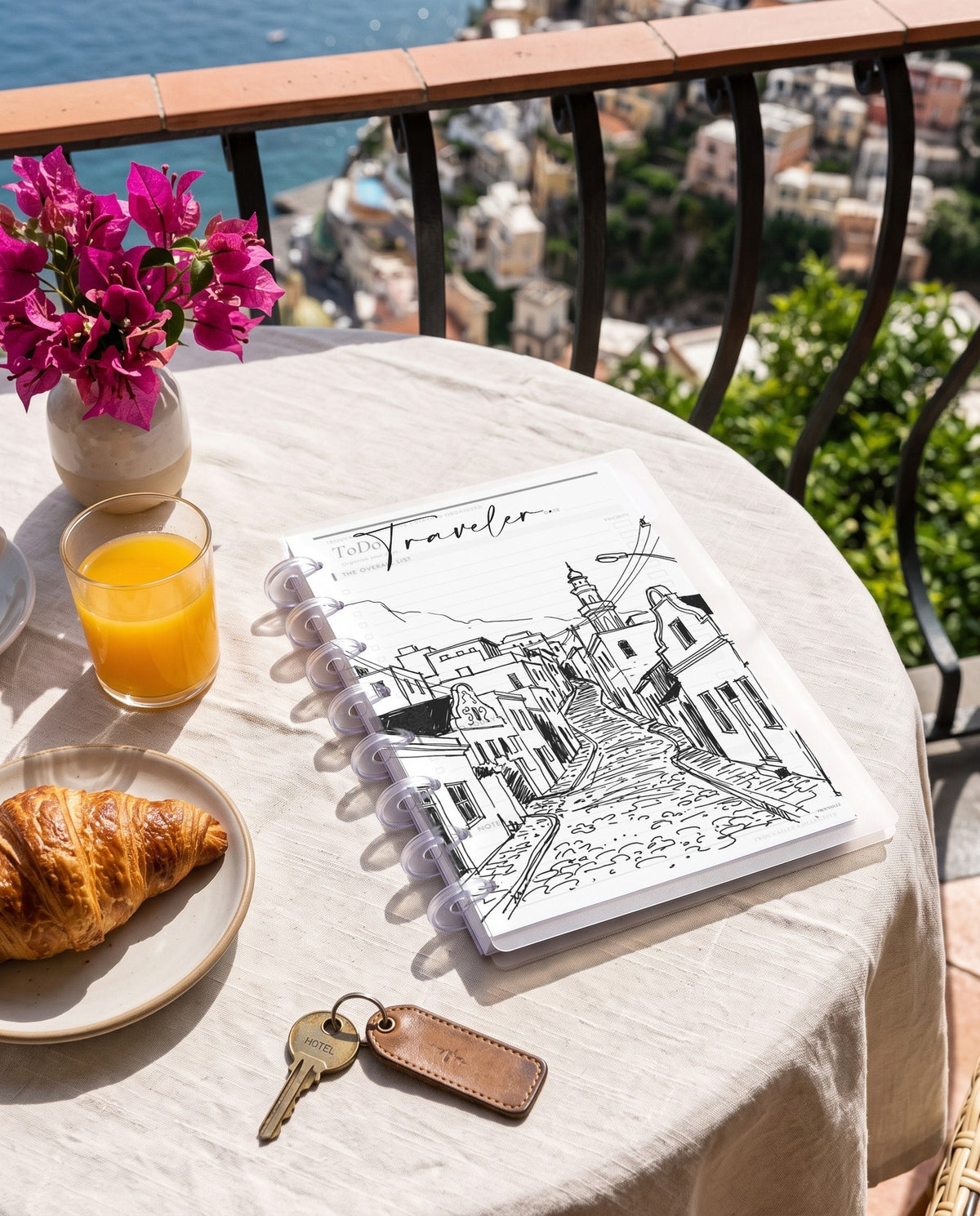Cape Town frosted planner dashboard inside a clear half letter discbound planner with 8 discs on a Positano balcony breakfast table