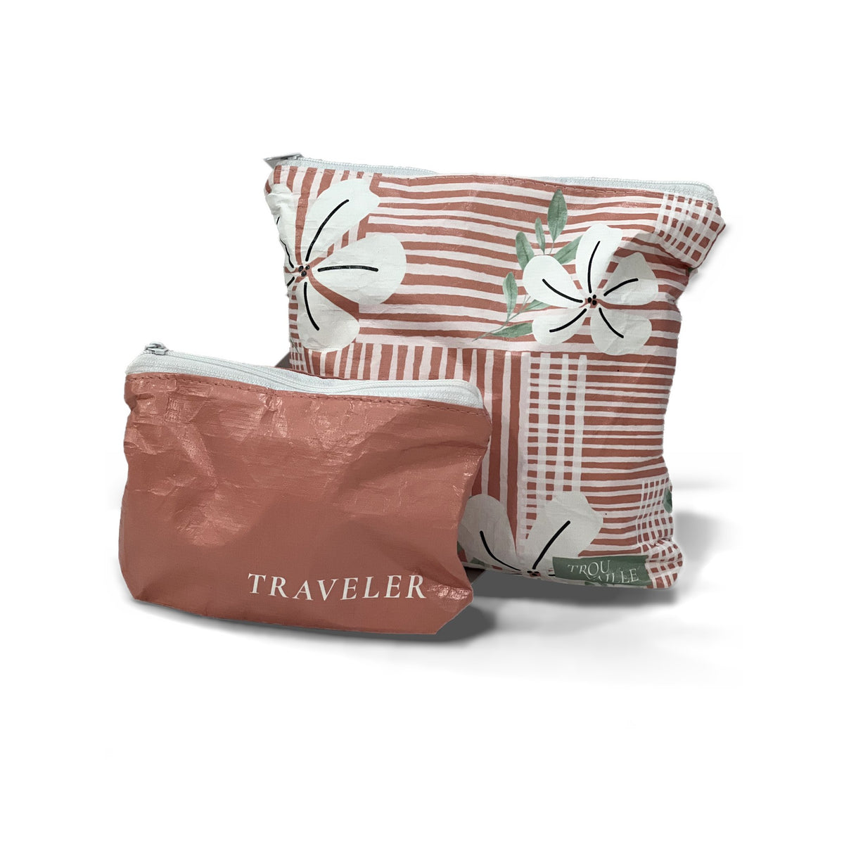 Coral Mini pouch in front of the matching Coral Flowers Small accessory bag