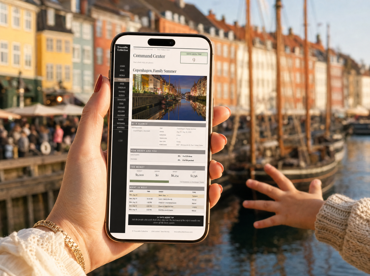A parent holds an iPhone showing the Family Edit Command Center at Copenhagen's colorful Nyhavn waterfront, a child's hand reaching in