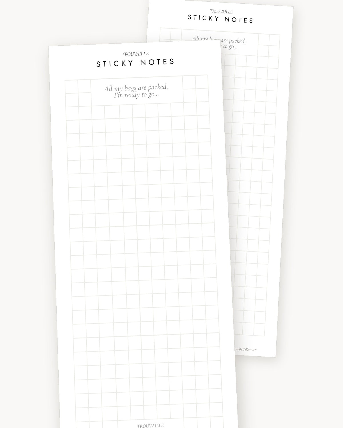 Two Graph sticky note pads angled on a warm white ground