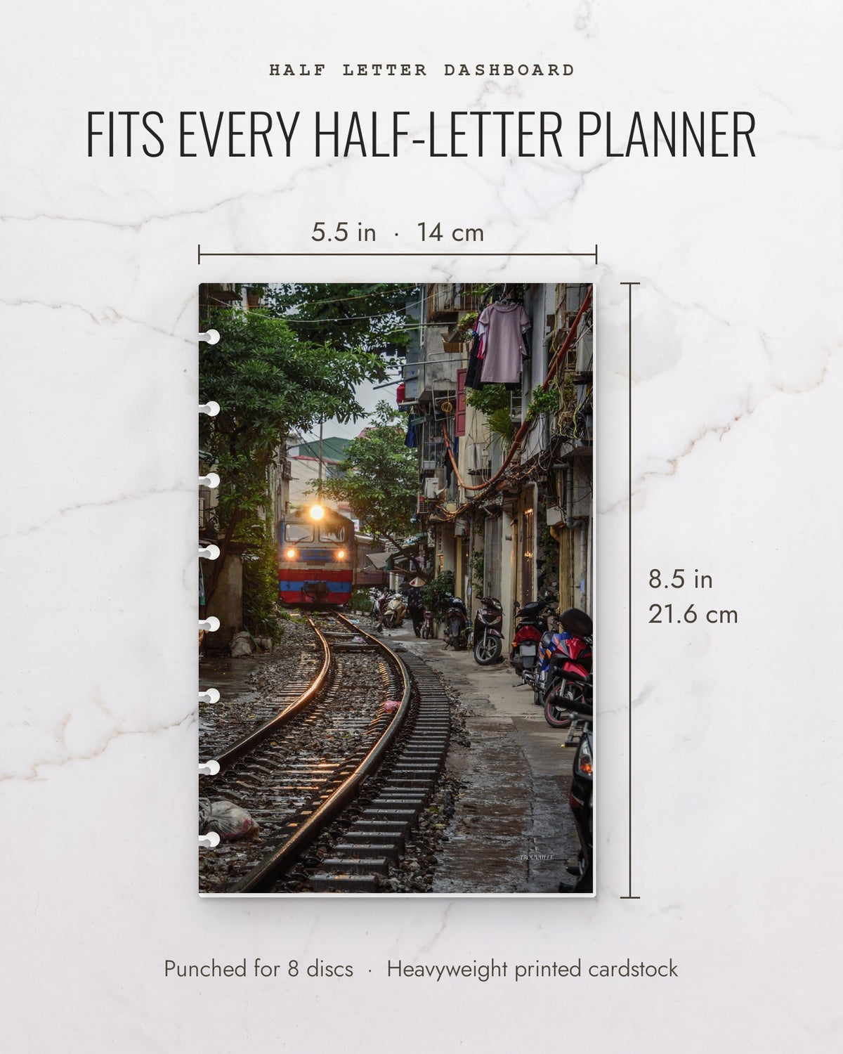 Vietnam Train cardstock planner dashboard measures 5.5 x 8.5 inches (14 x 21.6 cm), half letter, punched for 8 discs