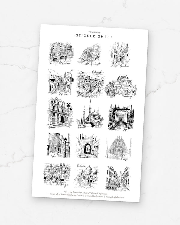 Cities clear sticker sheet on its backer card on white marble