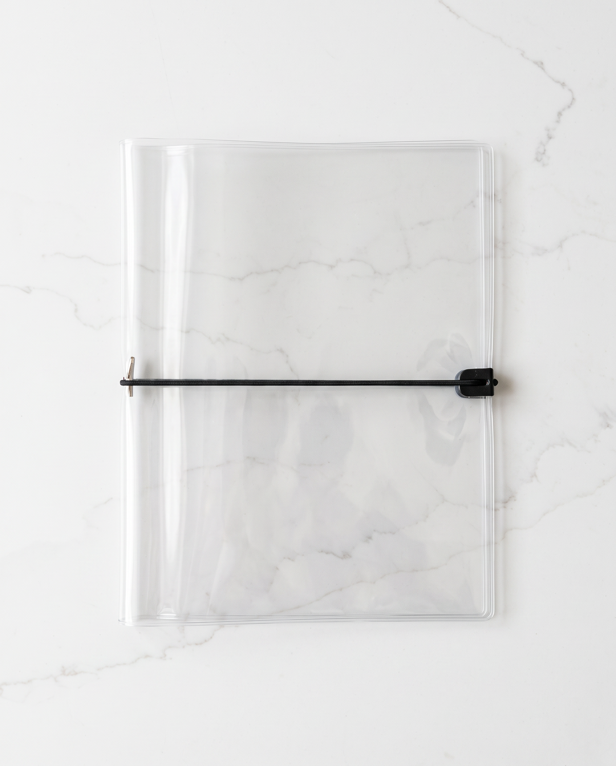 Clear half letter planner binder cover with thin black elastic cord