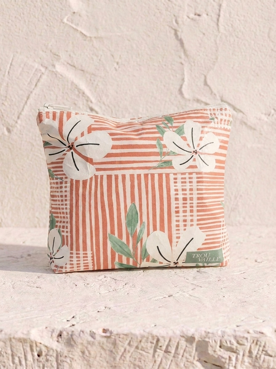 Coral Flowers small water-resistant accessory bag — an 8 x 7 inch zip travel pouch in a coral stripe print with white flowers