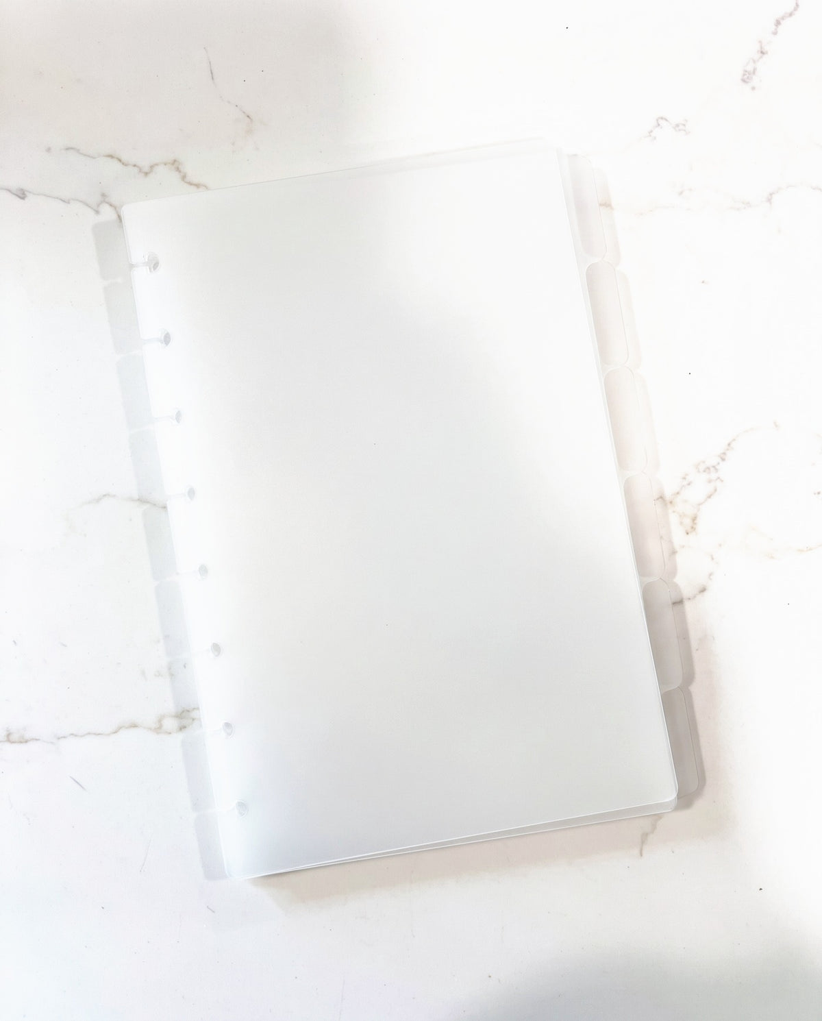 Frosted tabbed notebook dividers, set of 6, punched for 8 discs, on white marble