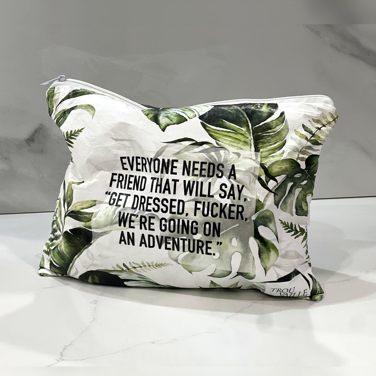 Get Dressed Medium flat accessory bag on a white marble counter
