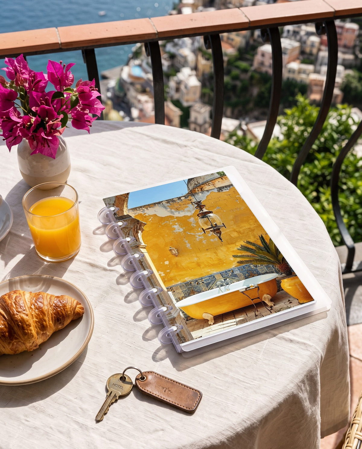 Yellow Tub cardstock planner dashboard inside a clear half letter discbound planner with 8 discs on a Positano balcony breakfast table